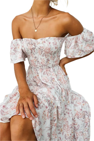 Close up of beautiful floral dress with short sleeve and elasticated bust.