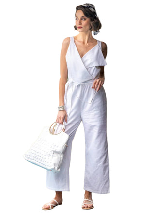 Light-weight white linen jumpsuit with side pant slits.