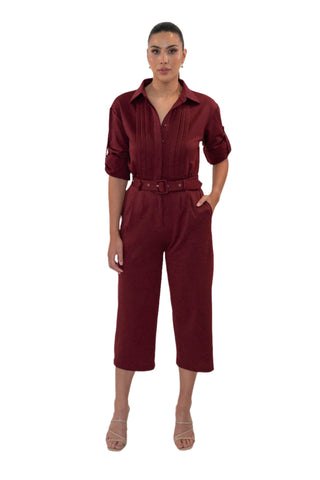 Burgundy jumpsuit with the option of short or long sleeves, belted waist and button up.