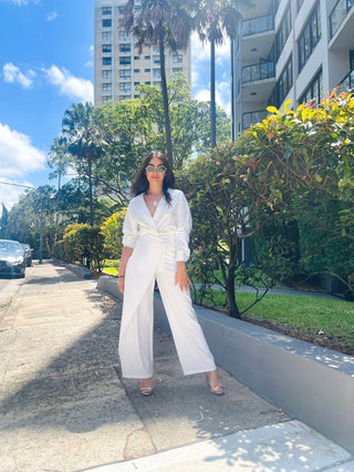 Amplified Beauty CEO Shahna Smith wearing our Henrix White cross over pant