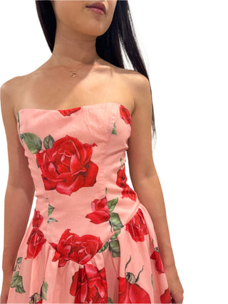 Close up of the beautiful rose print on strapless dress.