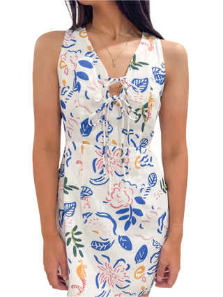 Close up of tie bust mini dress with print