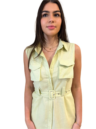 Close up view of button up lime green midi dress with front pockets.