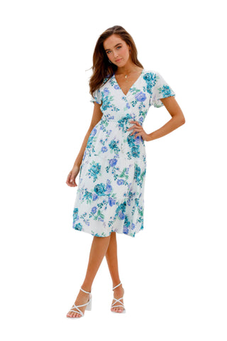 Printed flowy midi dress with tie waist and v neckline.