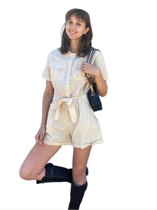 Safari style playsuit in cream linen, styled with boot and b