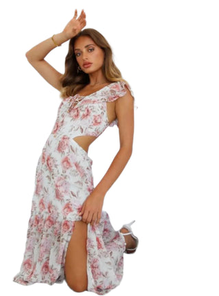 Beautiful floral print maxi dress with cut out sides and front slit.
