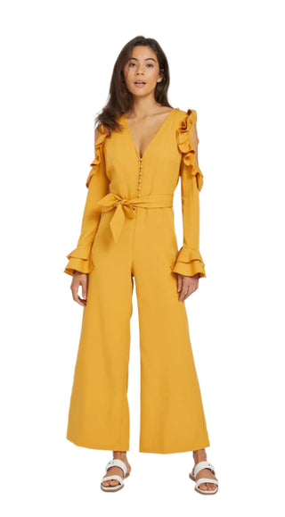 Dijon pantsuit with ruffles on wrist and cut out sleeve, button up with v neckline.