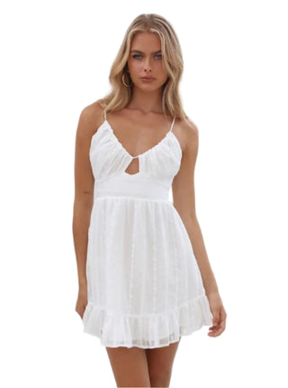White flowy mini dress with cut out.