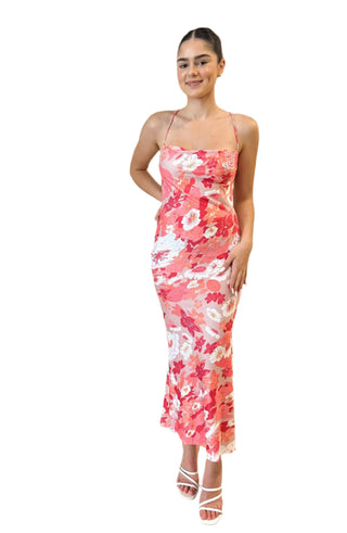 Fitted floral print maxi dress with open back.