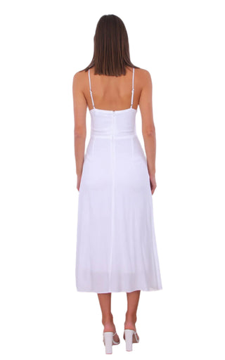 Back view of white midi dress with adjustable straps and back zip.