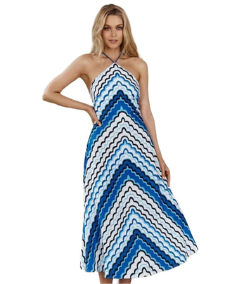 Model showing how flowy halterneck midi dress is.