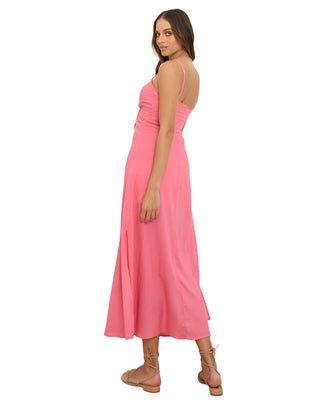 Side view of pink midi dress with adjustable straps and zip up closure.