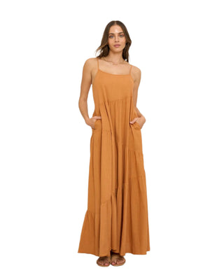 Rust maxi dress with side pockets.