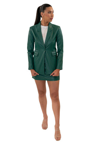 Vegan leather blazer styled with its matching mini skirt and t shirt.