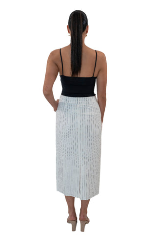 Back view of pinstripe linen midi skirt with back split.