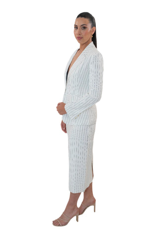 Side view of linen white pinstripe blazer and matching skirt suit.