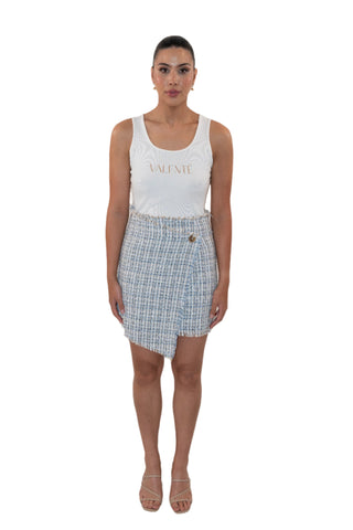 Tweed cross over skirt styled with tank top.