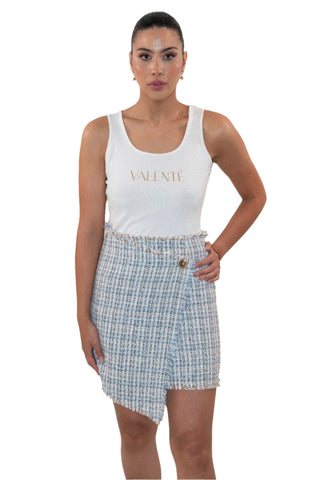 Tweed blue and white cross over mini skirt with frayed hem.