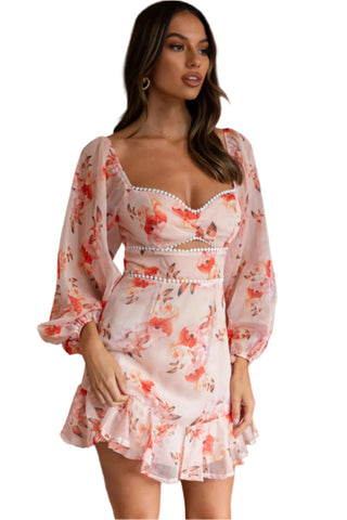 Side view of beautiful flowy mini dress with bust detail and under bust cut out.
