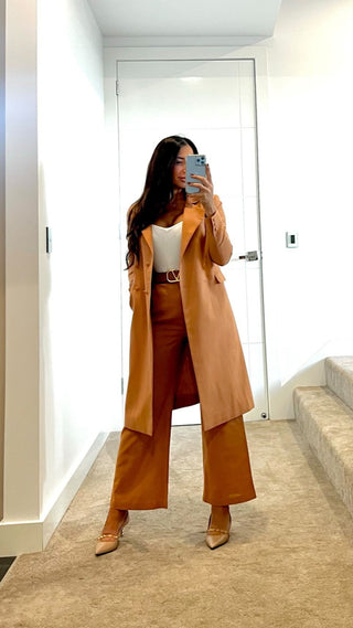 Dr Luve Brigitte Zonta wearing our two piece matching blazer and pant set in caramel linen, long line jacket and high waisted pant.