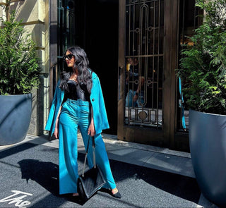 Amplified Beauty CEO Shahna Smith wearing our blue pinstripe Pienza Pant and Matteau Blazer