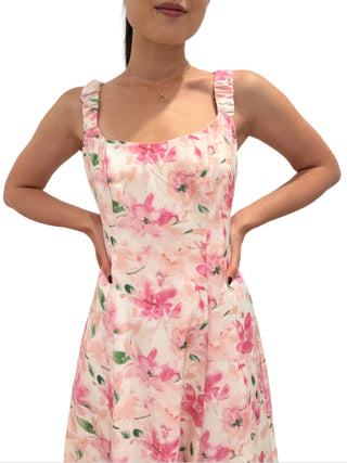 Close up view of the floral print on the maxi dress with ruched straps and fitted bodice.
