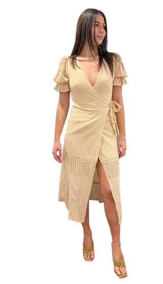 Cross over midi dress with tie waist and short ruffle sleeves.