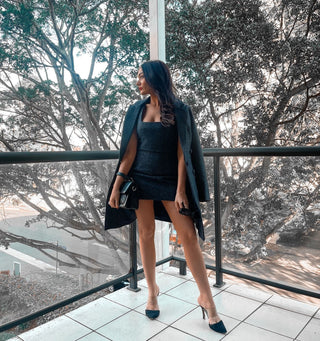 Amplified Beauty CEO Shahna Smith wearing our navy tweed single breasted coat and matching mini dress