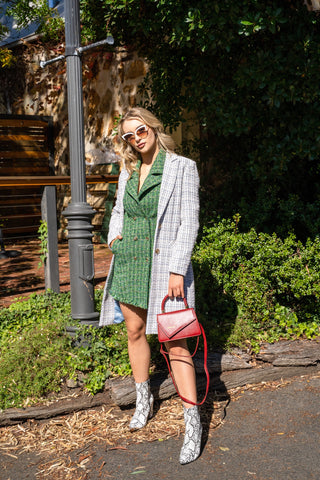 Tweed layered over tweed, green tweed blazer/dress styled with blue and white tweed jaccket and ankle boots.