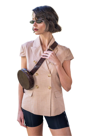 Camel coloured short sleeved, double breasted blazer.