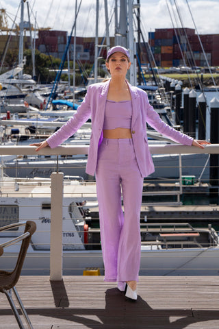 Three piece matching set with lilac crop top, blazer and pant.