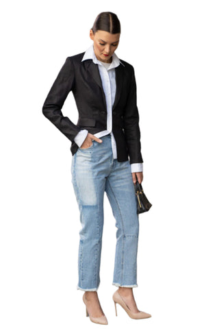 Unique black blazer with built in white shirt styled with denim jeans and heels.