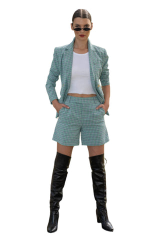 Checked green shorts with matching blazer and white tank