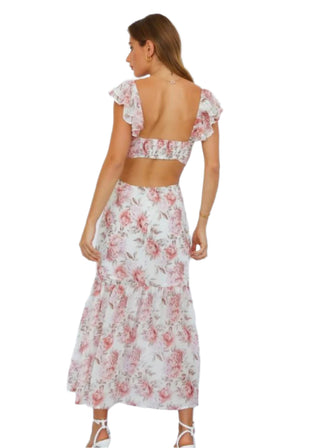 Back view of floral cream and pink maxi dress with cut out back and ruffle short sleeve.