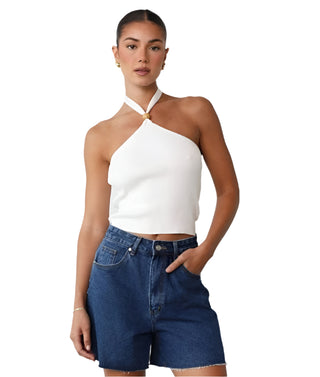 White halterneck crop knit top.