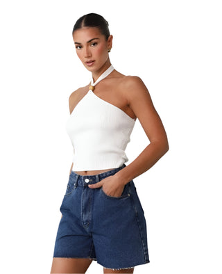 Side view of white halterneck top with front detail.