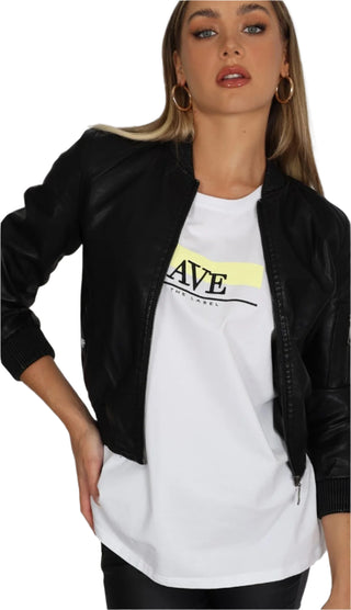 White logo t shirt styled with black biker jacket.