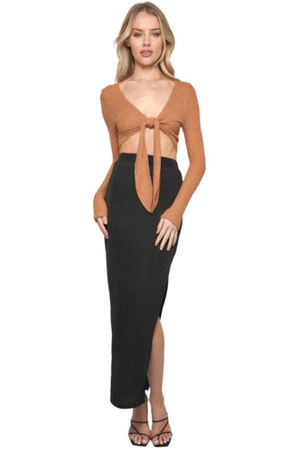 Black elastic waist maxi skirt with side slit.